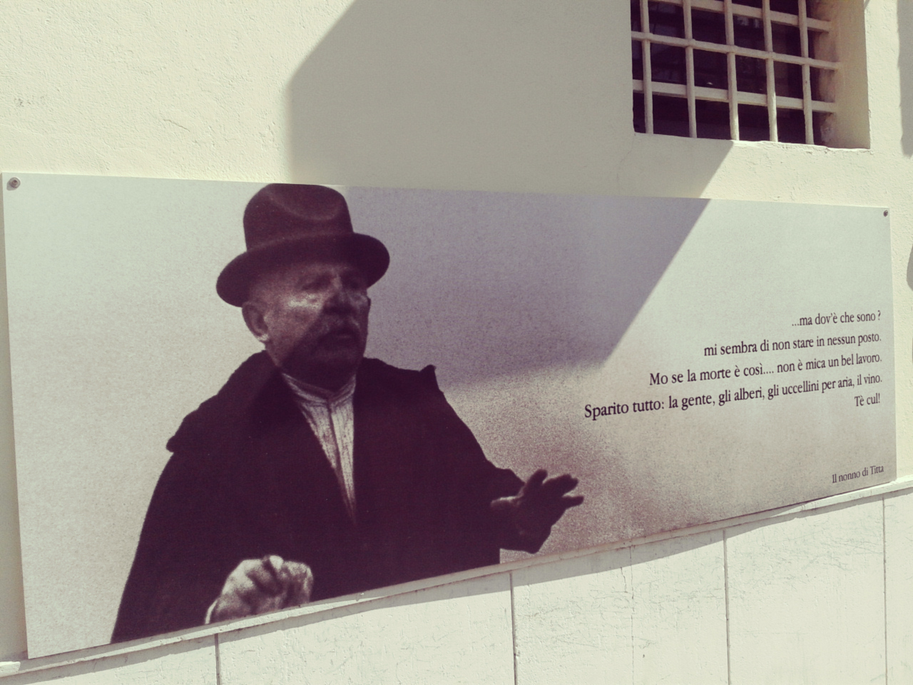 Fellini quotes on the walls near Rimini's Market