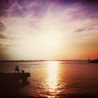 Fishing on Rimini's Pier at Sunset